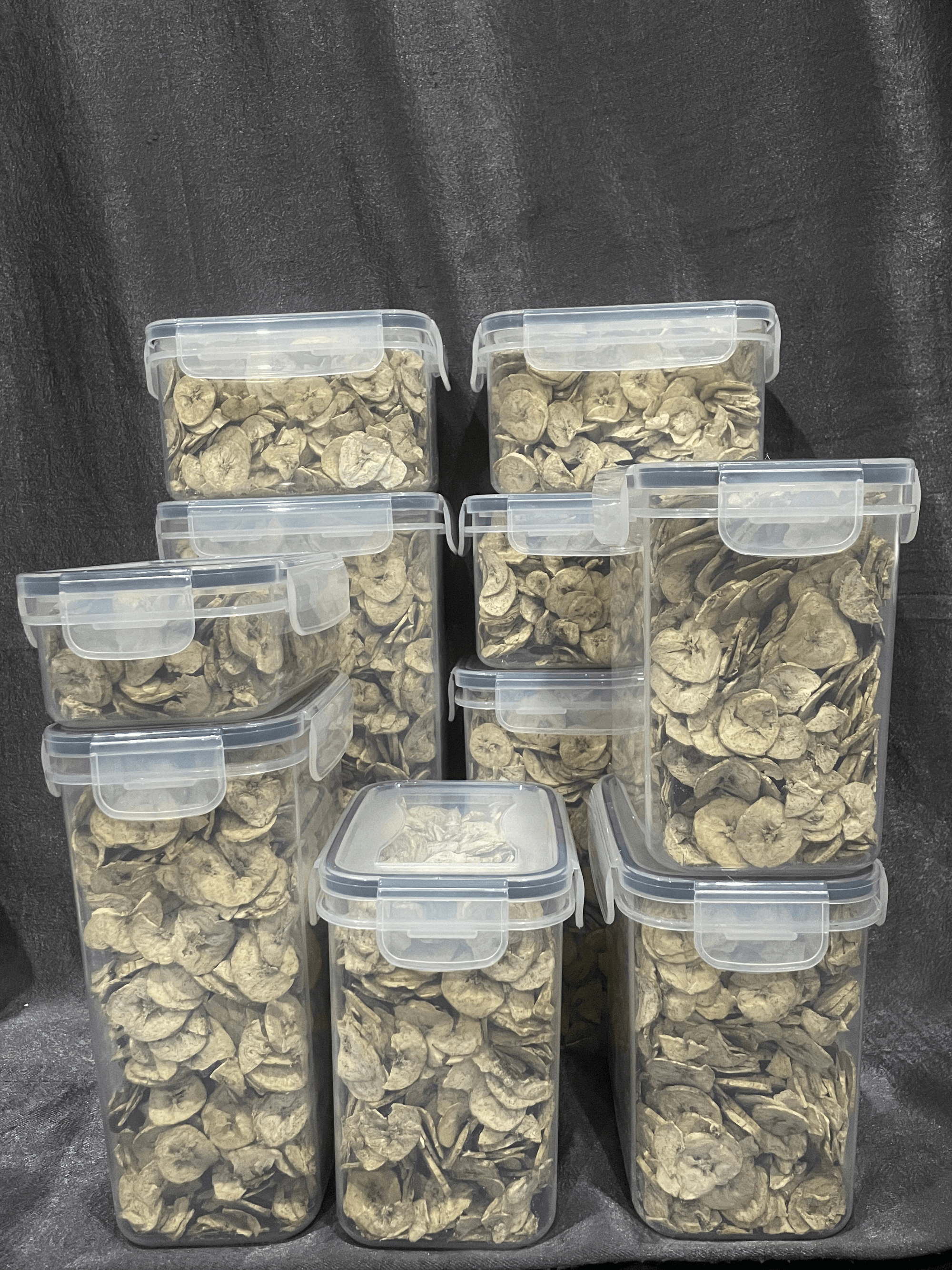 Dried unripe plantains in food-grade storage containers