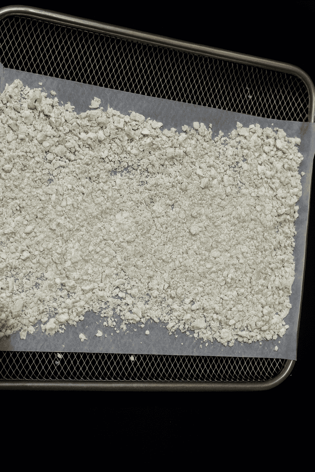 Fresh sliced plantains on dehydrator trays